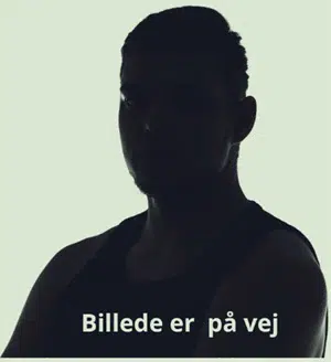 Skyggen af en mand, hvilket indikerer, at vi ikke har det rigtige billede endnu, men at det er på vej