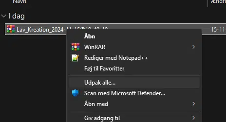 Højreklik på filen og vælg Udpak alle...