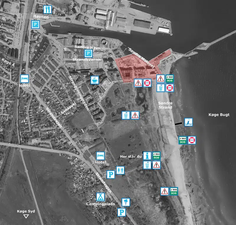 Oversigtskort over Søndre Strand med pictogrammer, der viser hvilke faciliteter der findes og hvor de er placeret